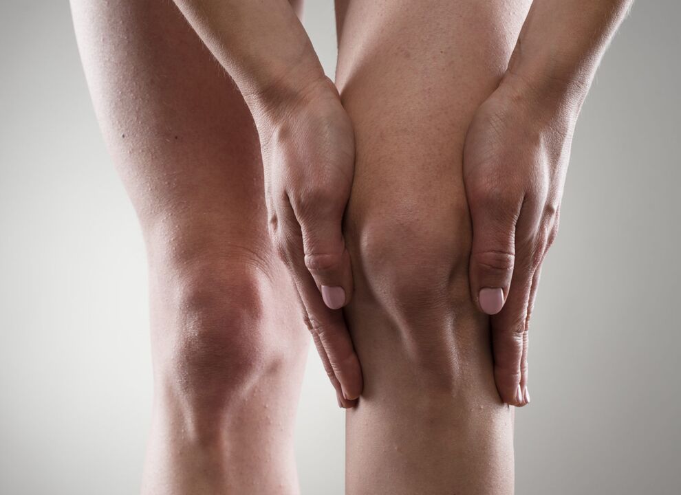 Osteoartrite da articulação do joelho, manifestando-se como dor e rigidez